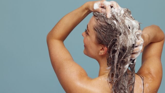 The hair-washing frequency question — what actually happens when you wash less